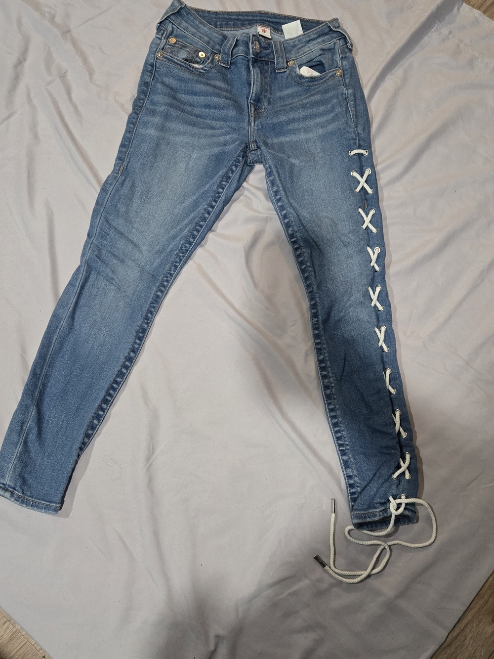 True Religion Light Blue Skinny Jeans with White Lace-Up Side